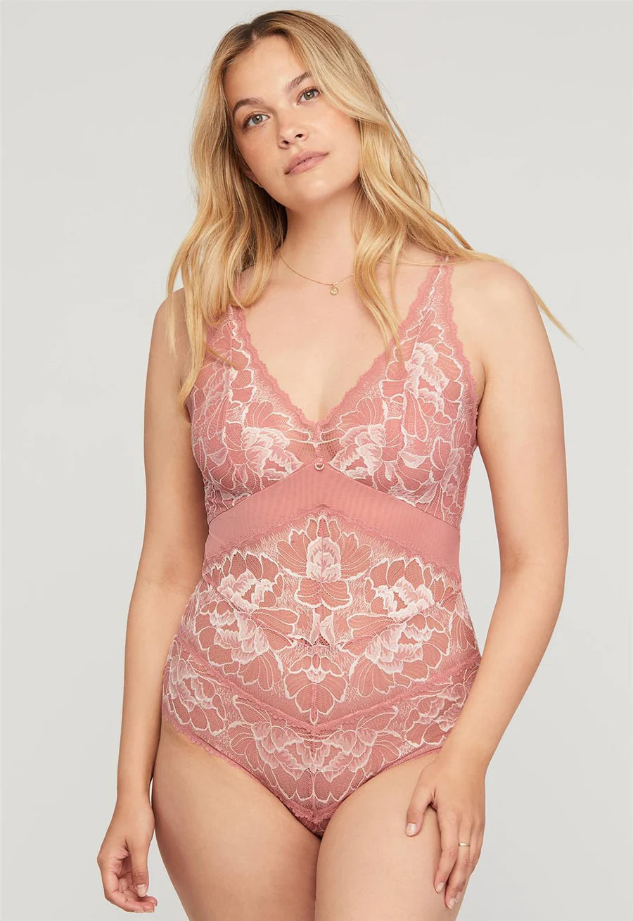 Ruffled Bodysuits with a Playful and Feminine TouchBlushing Tanga Bodysuit