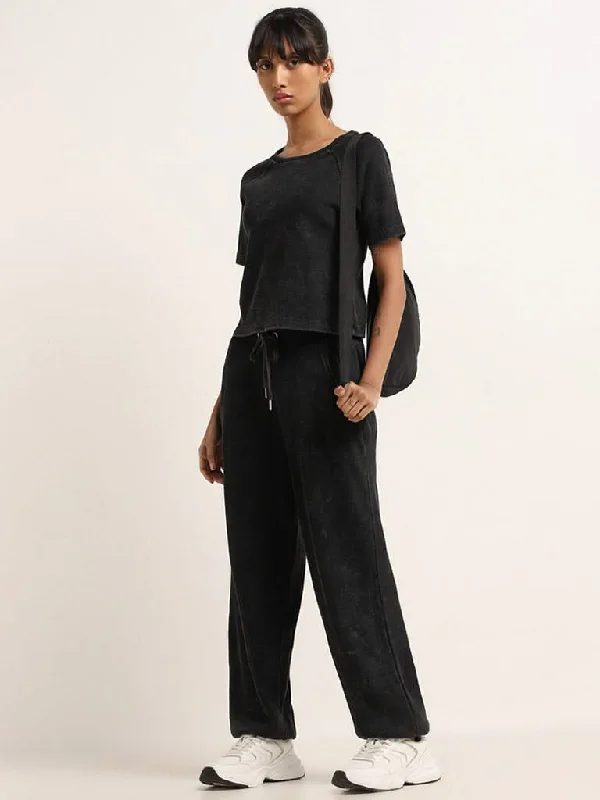 Solid Color Women Shorts in Bright Hues for a Bold StatementStudiofit Black Waffle Textured High-Rise Cotton Track Pants