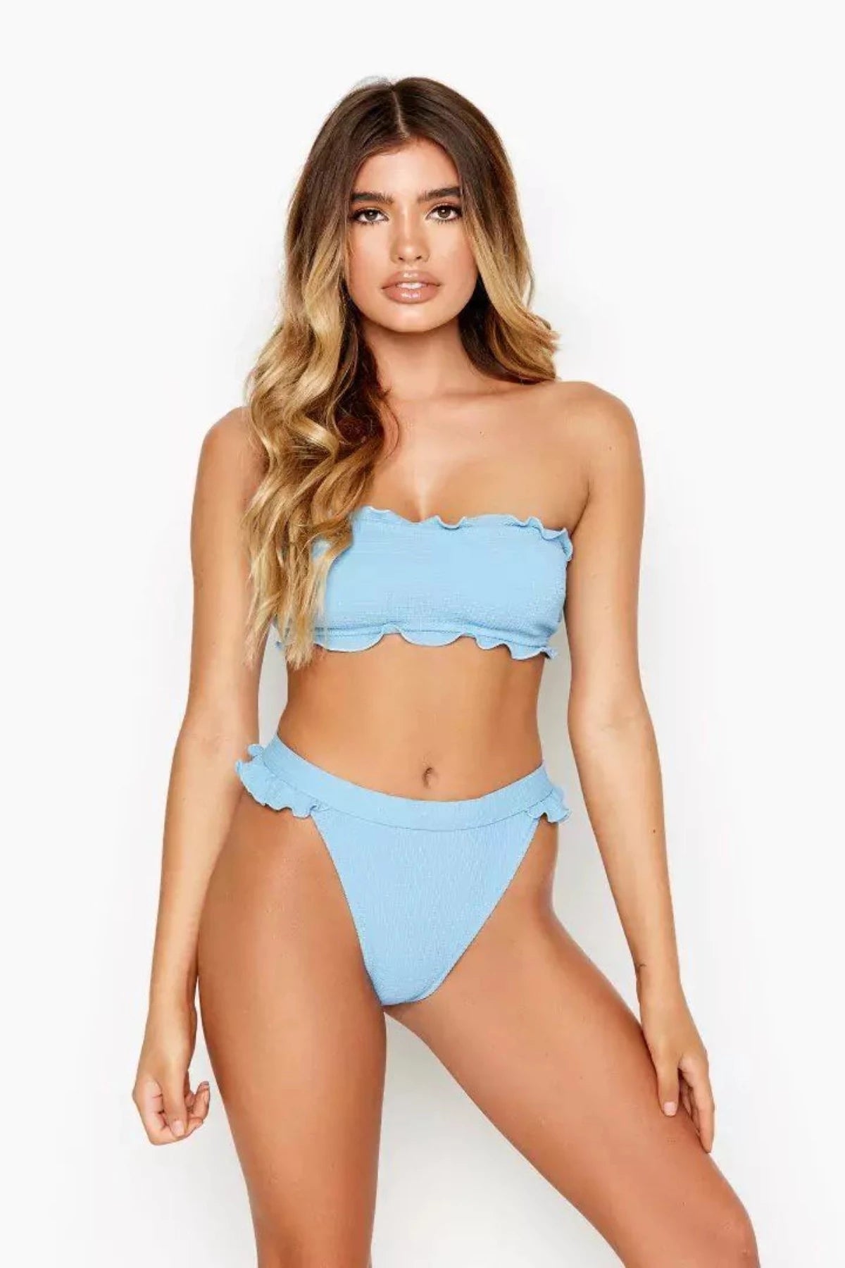 Ruched bikini with fabric gathers for a slimming effectRis-k Brand Prowl Top